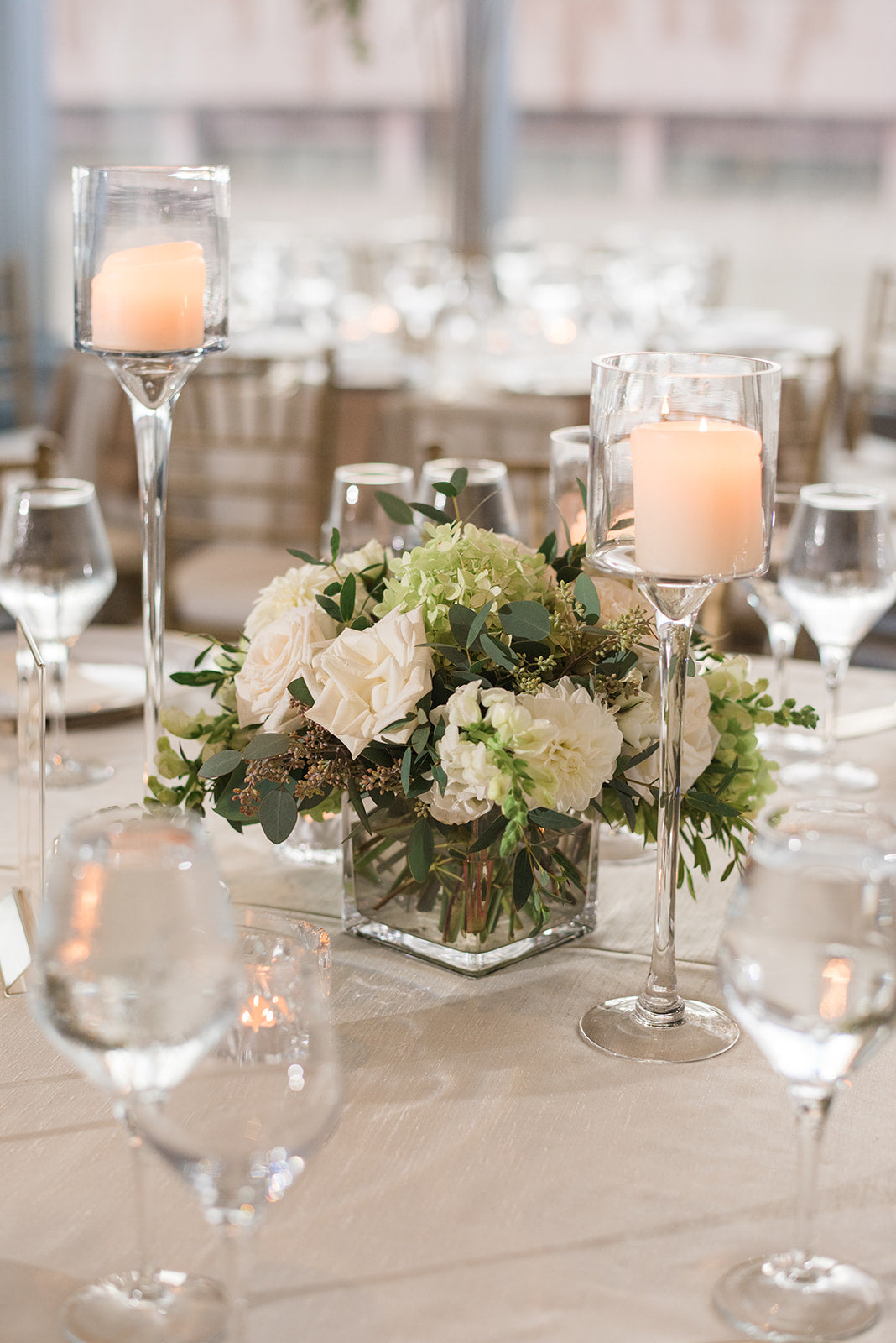 white and green wedding Centerpiece with pillar candles Sweet Blossoms LLC