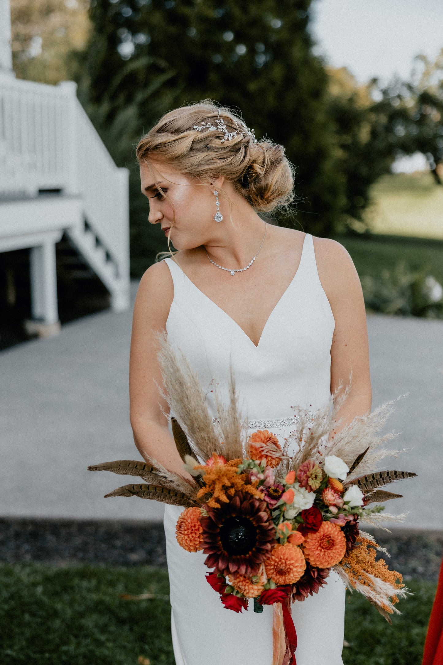 Fall wedding Bouquet with dahlias, feathers and dried grasses Sweet Blossoms LLC