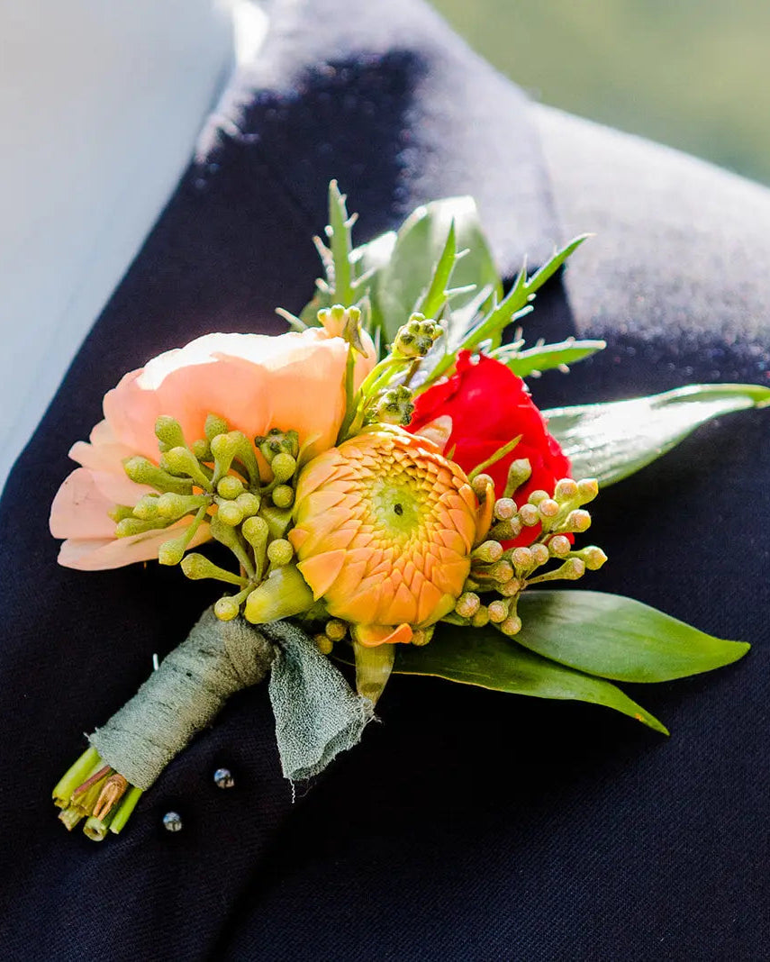 Boutonniere Sweet Blossoms LLC