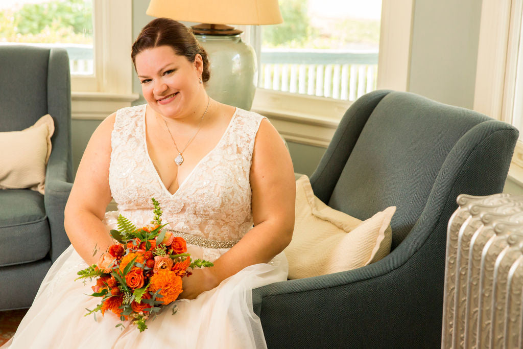 Wedding bouquet with roses and ferns Sweet Blossoms LLC