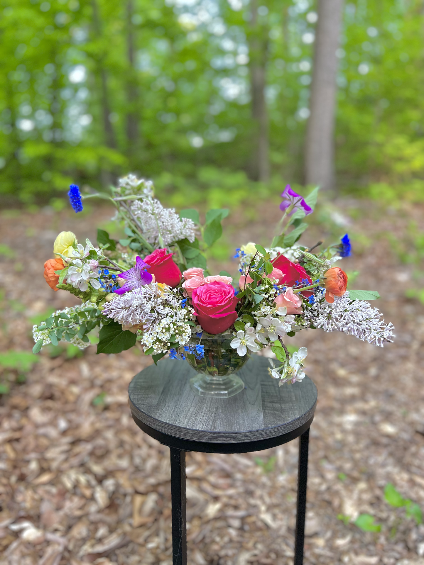 Small Urn arrangements with seasonal spring flowers Sweet Blossoms LLC