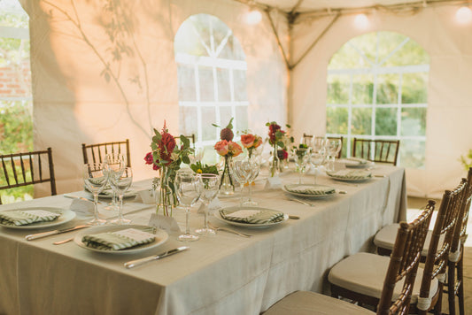 Long table wedding table with Bud Vases Sweet Blossoms LLC